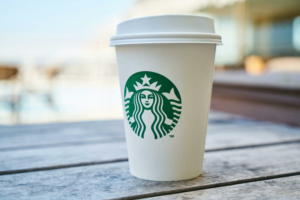 Starbucks cup showcasing their iconic logo and branding