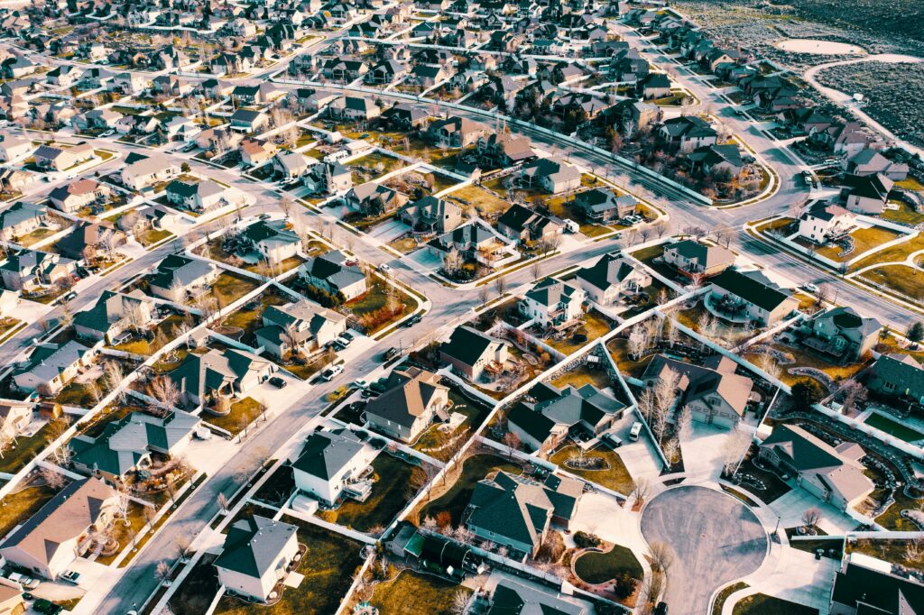 Aerial view of a neighborhood where a real estate agent could do geo-farm marketing with door hangers for realtors